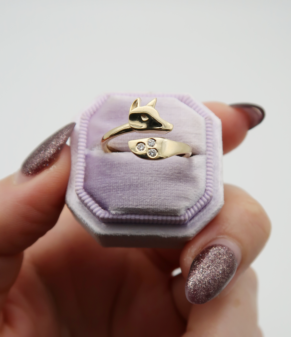 Every curve, every diamond, every tiny detail of this custom ring was carefully considered to capture the spirit of a fox. On the day my client’s father passed away, she spotted a fox in her backyard, one she’d never seen before. The animal kept returning, as if watching over her. She began to see the fox as her father’s spirit, checking to make sure she was safe. This ring is a beautiful symbol and daily reminder of her late father’s love and protection. 