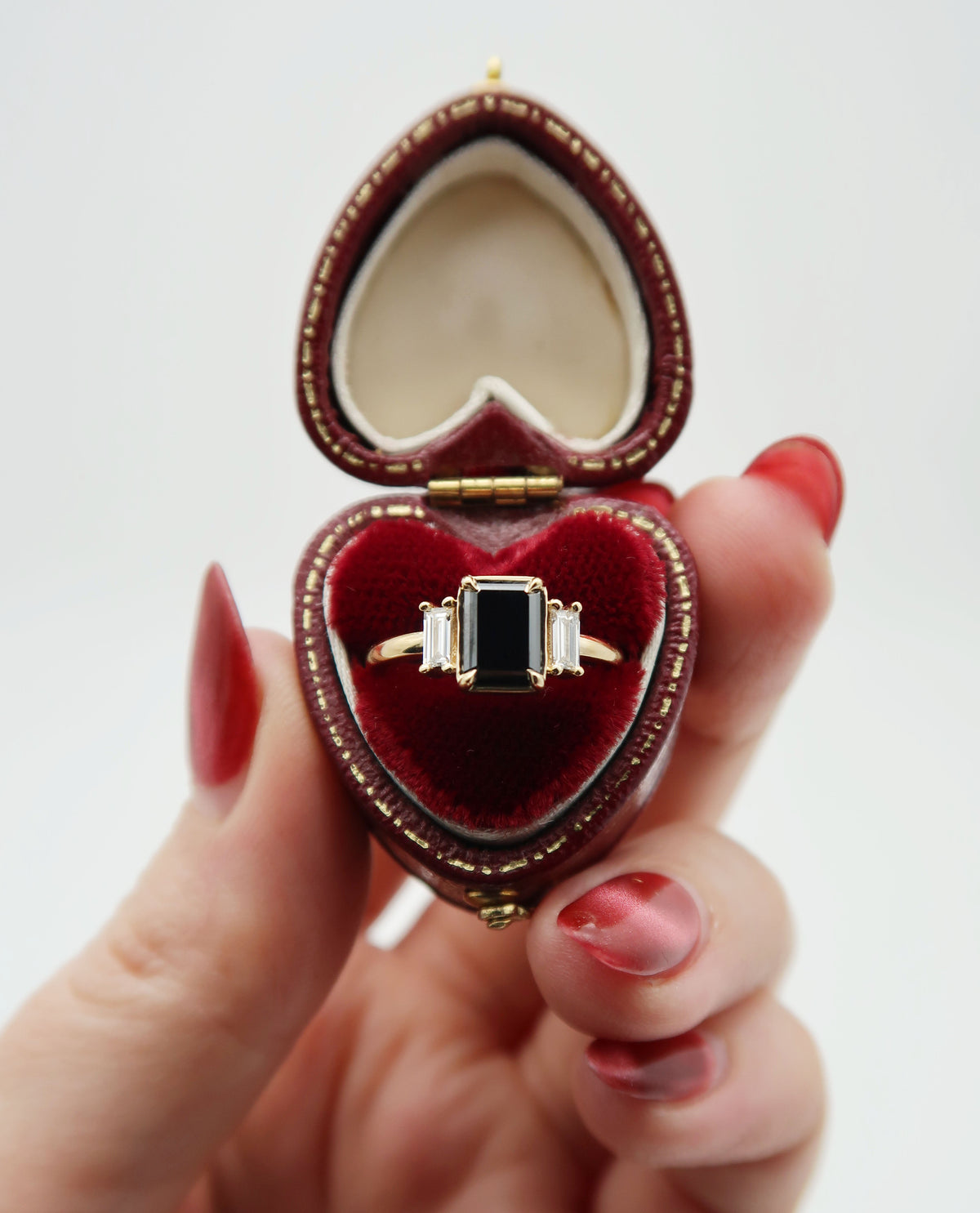 A customized version of one of my classic collection pieces, this Art Deco inspired, 14k yellow gold engagement ring features an emerald cut black diamond, giving this timeless piece a moody and romantic quality.