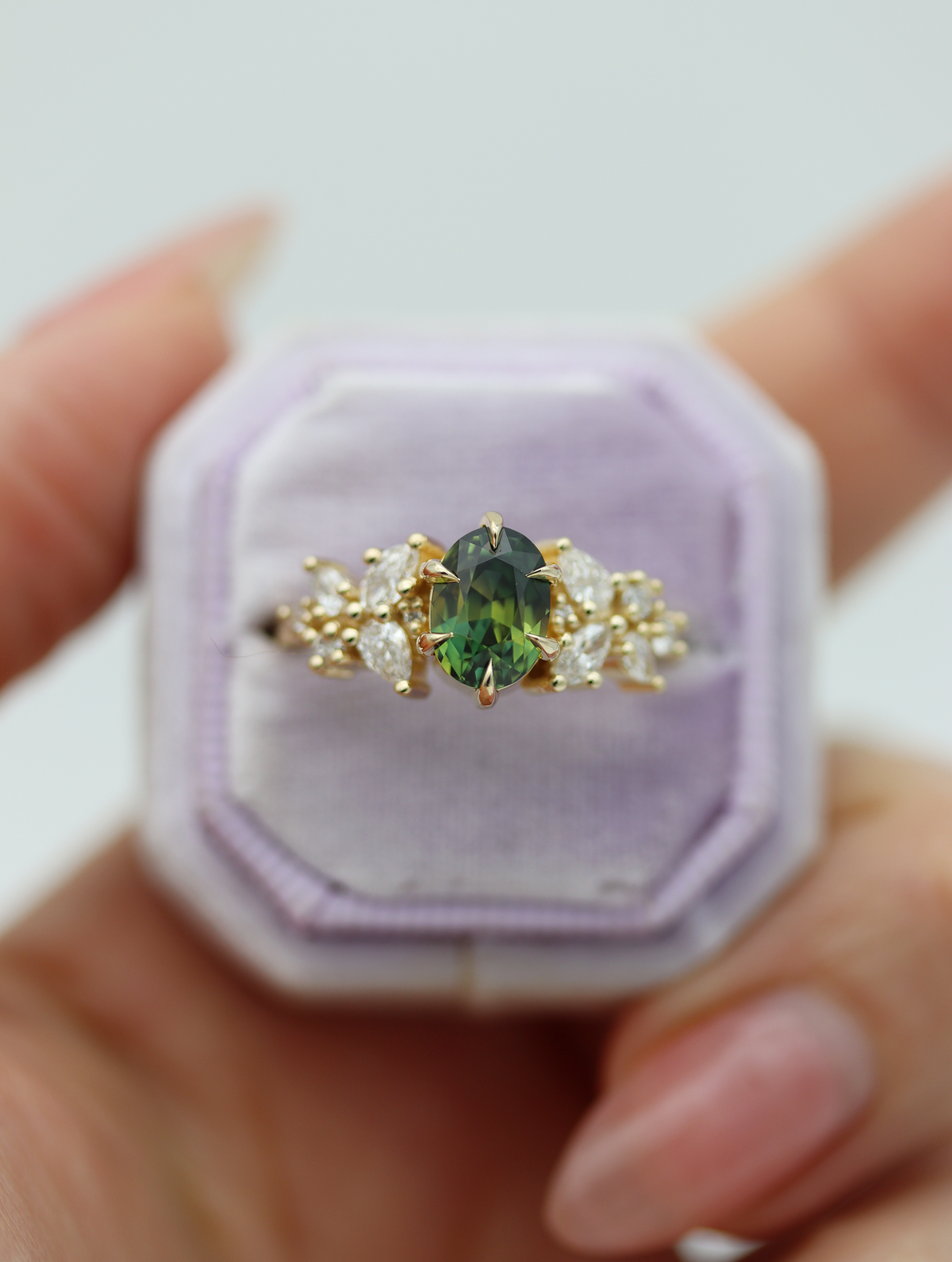 A customized version of the Adair engagement ring, featuring a breathtaking two-tone parti sapphire set in warm 14k yellow gold! This beauty travelled all the way to France for her big proposal moment!