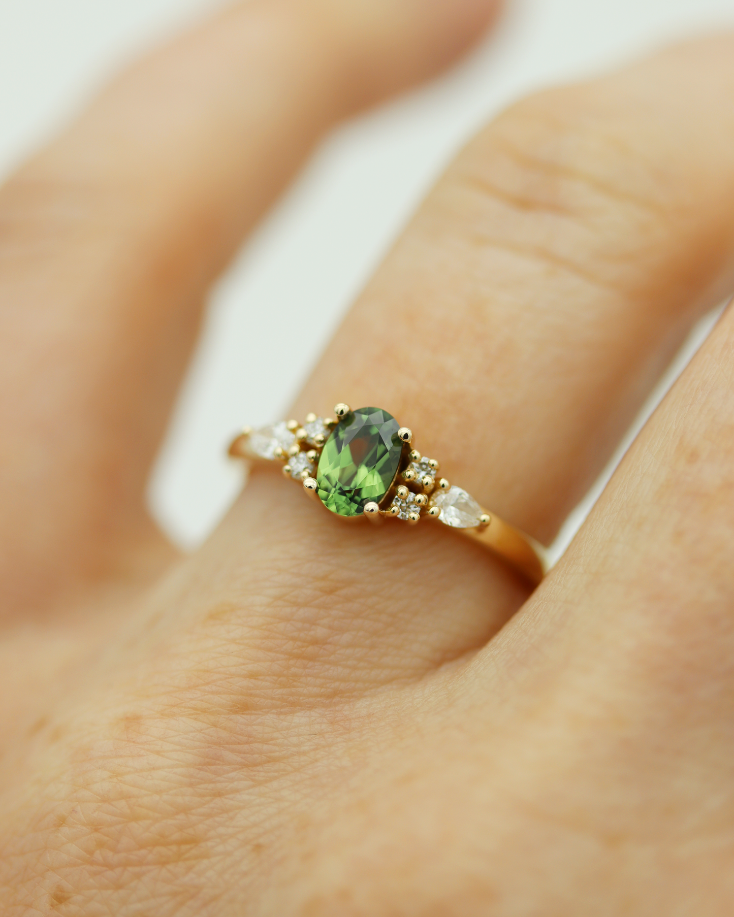 Isla 0.60ct Oval Cut Green Sapphire and Diamond Engagement Ring