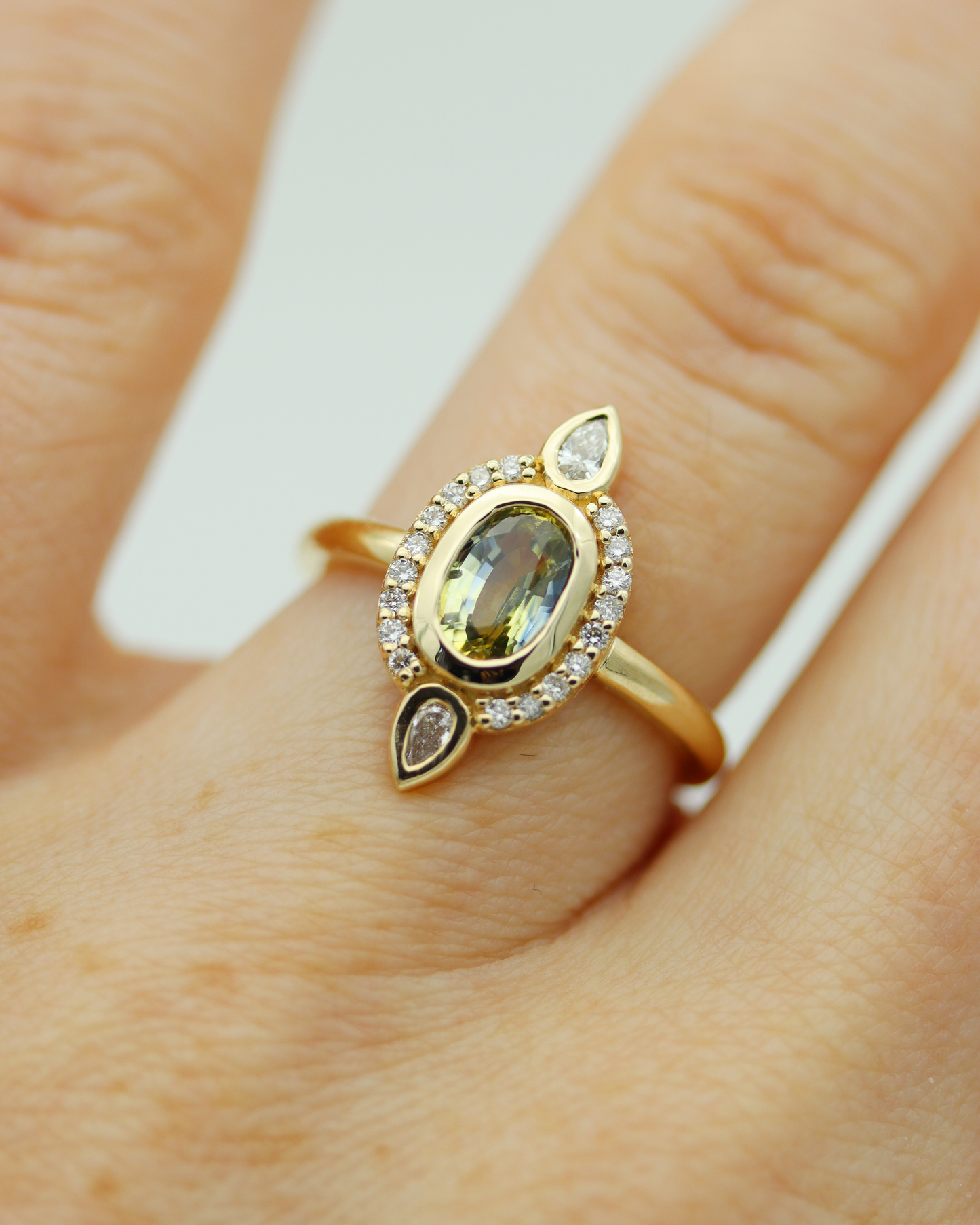 Elspeth 0.78ct Oval Cut Parti Sapphire and Diamond Halo Ring